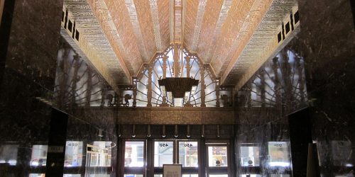 Photograph of the lobby of the Sutter Building, with its haunted mayan designs and spooky history.